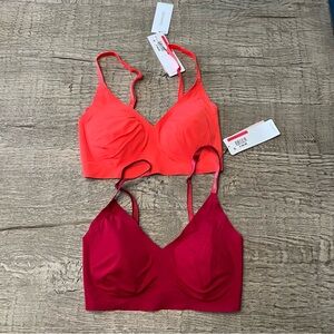 Two Calvin Klein lightly padded triangle lounge bras size XS